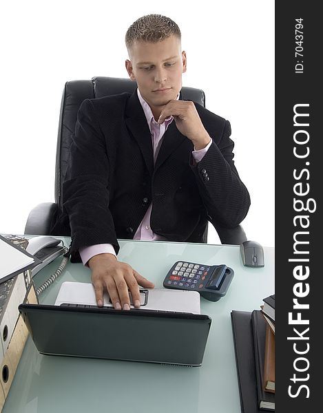 Businessman working on laptop on an isolated white background