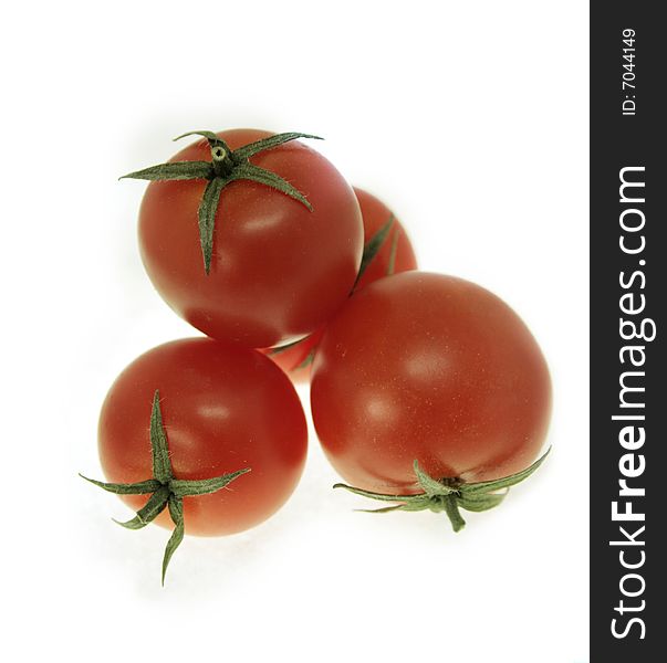 Group of 4 tomatos . isolated