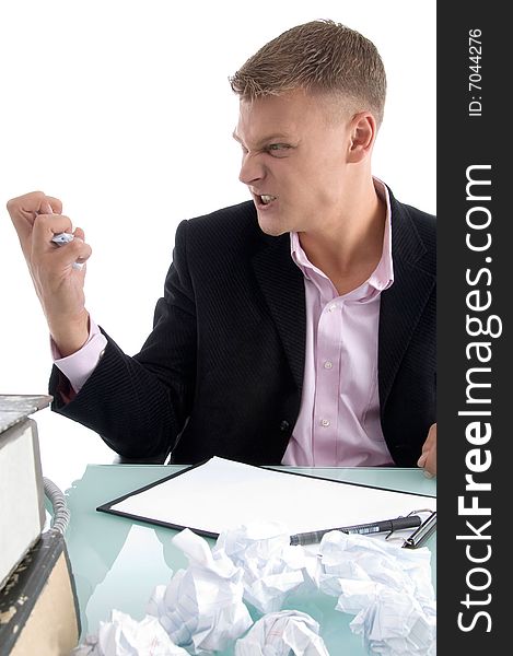 Young professional squshing the paper  with white background