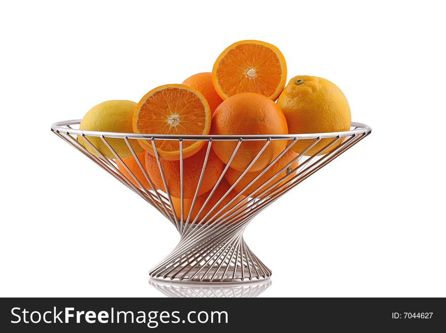 Orange and Lemon on fruit basket isolated on white. Orange and Lemon on fruit basket isolated on white