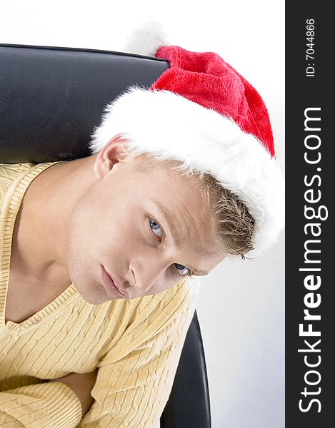 Close up of male in christmas hat on an isolated white background