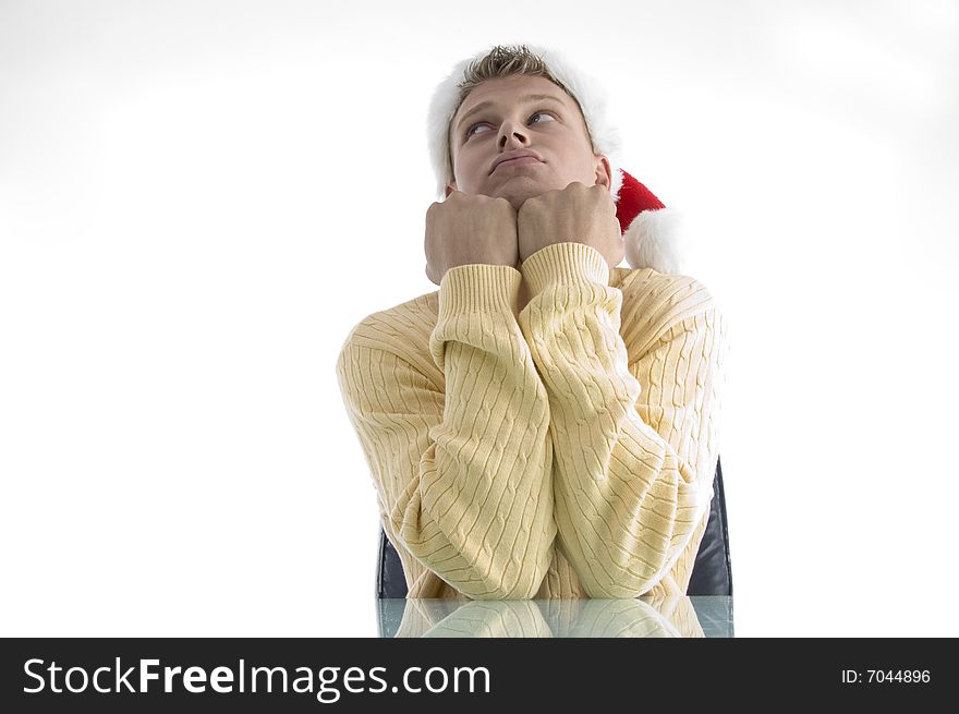 Sad man wearing christmas hat with white background