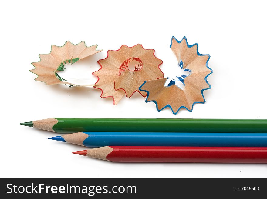 Wooden chippings and colored pens. Wooden chippings and colored pens