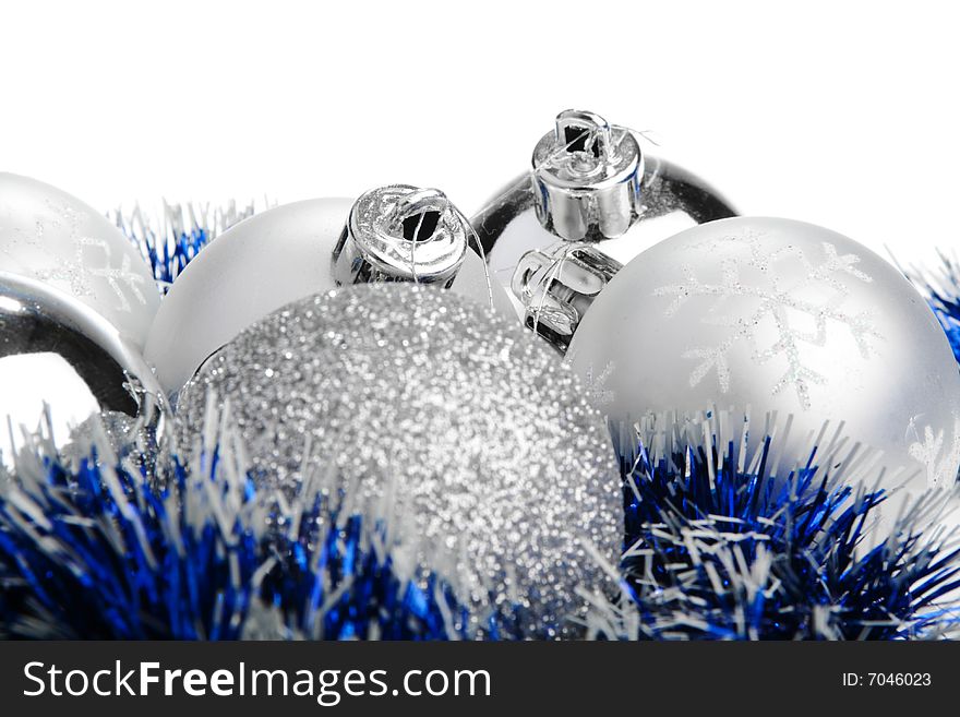Silver Christmas balls on a white background