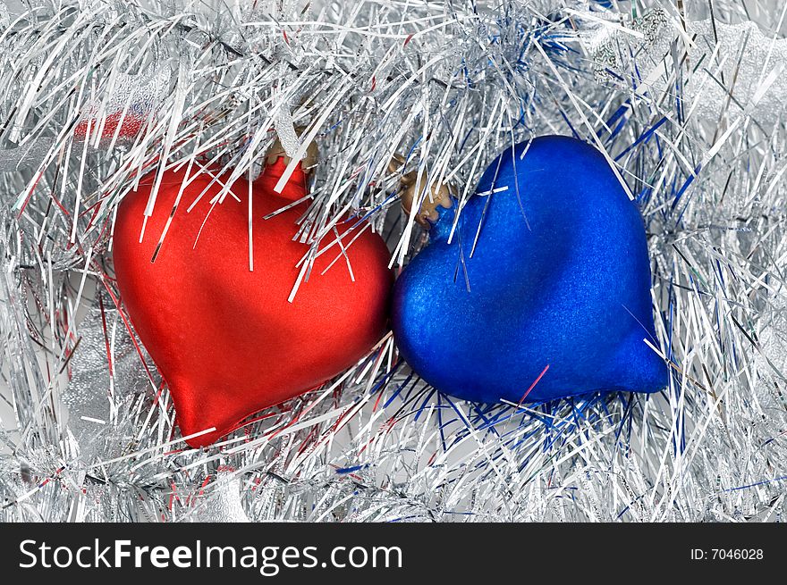Christmas red and blue heart ornaments, on white background. Christmas red and blue heart ornaments, on white background.