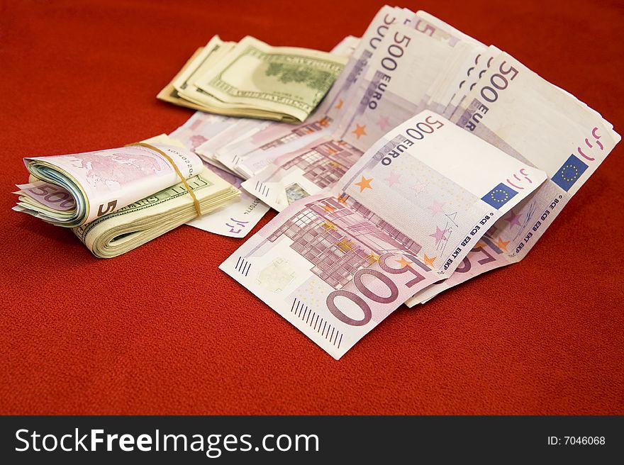 Pile of various money; euro and US dollar. Pile of various money; euro and US dollar