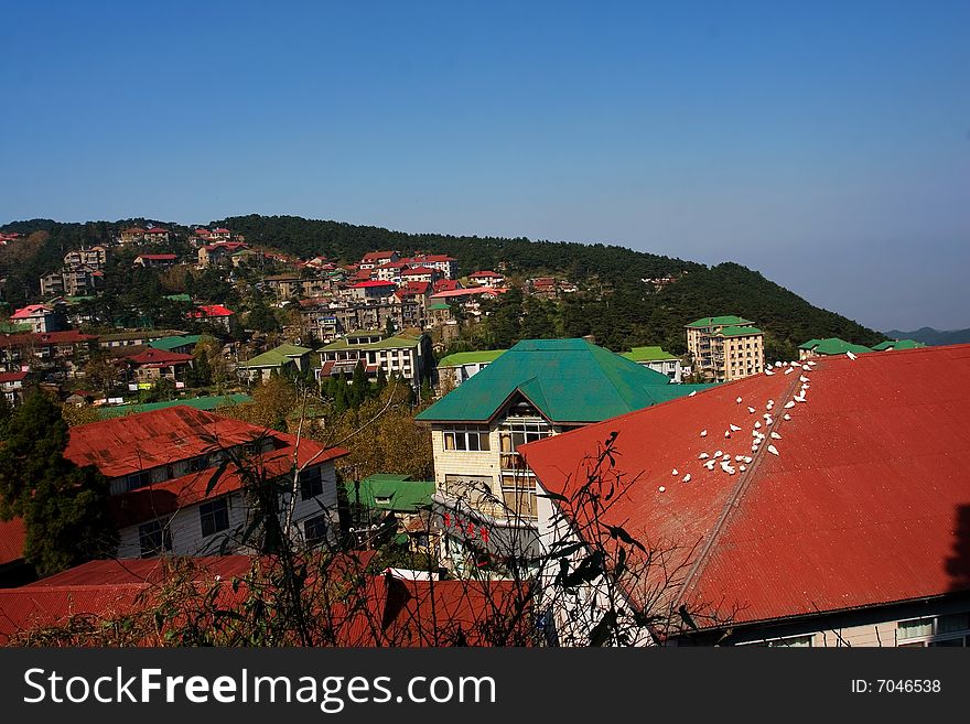 The villa on the mountains with blue sky background.