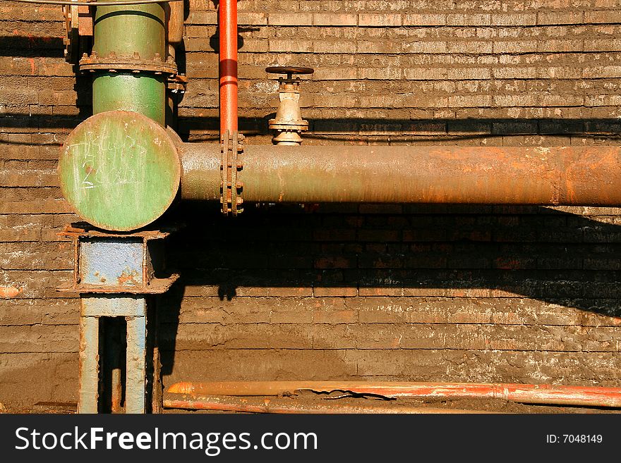 Pipe conducting water to coking chimney. Industrial architectural detail in Silesia (Poland)