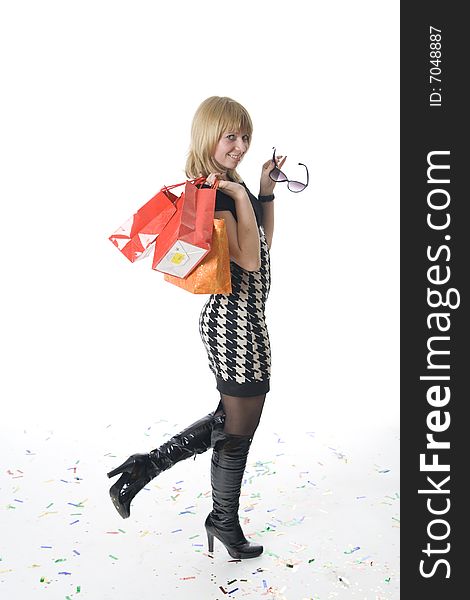 The young beautiful girl with packages isolated on a white background
