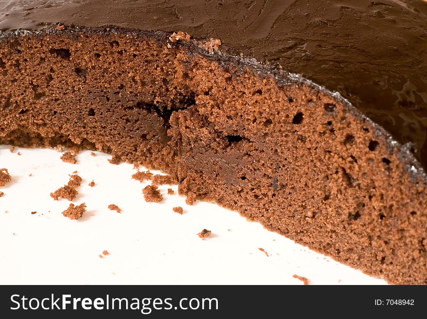 Tasty chocolate cake on a white background