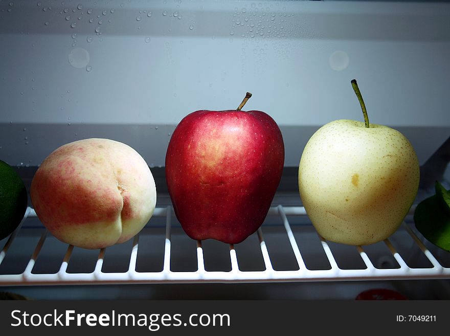 Fresh apple and pear  in icebox. Fresh apple and pear  in icebox