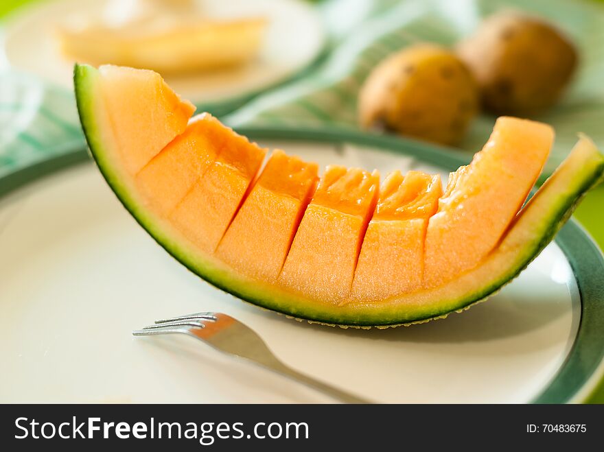 Fresh cut melon on a plate