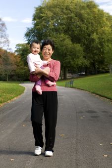 Grandmother And Granddaughter In Park Stock Photo Grandmother And Granddaughter In Park Stock Photo