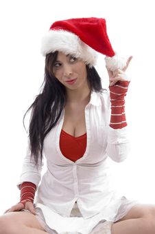 Sitting Sexy Young Female Holding Christmas Hat Royalty Free Stock Photo