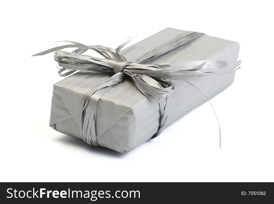 A photo of one gift box over white