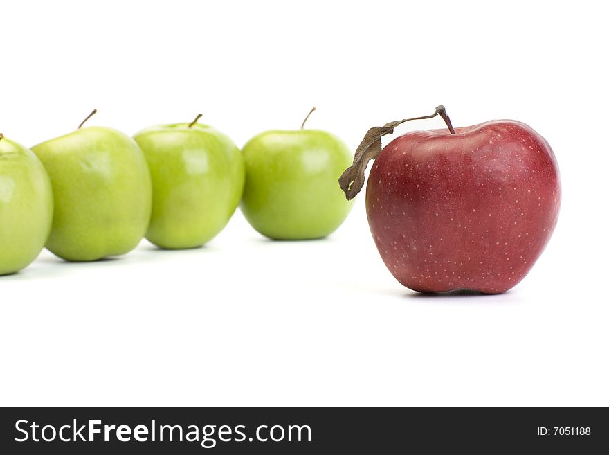 Group of green apples with one red. Group of green apples with one red