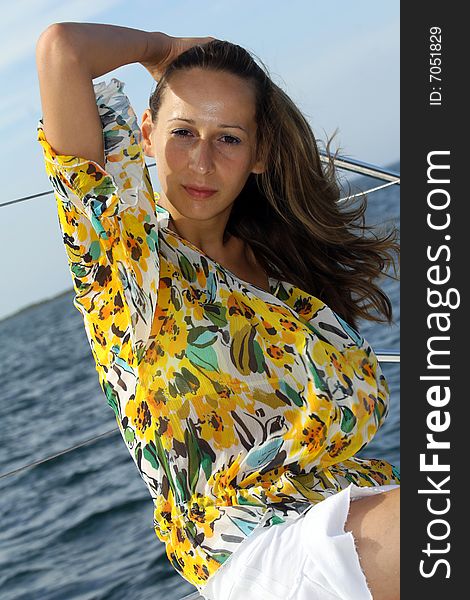 Woman posing on the boat in caribbean sea. Woman posing on the boat in caribbean sea