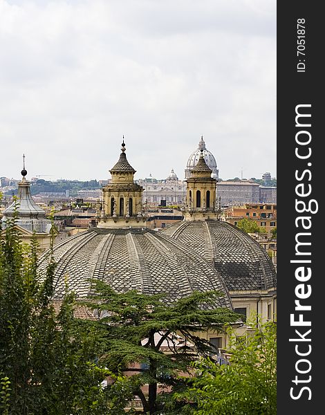 Roofs of several round buildings near piazza del popolo in rome, italy