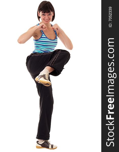 Karate. young woman isolated on white background.