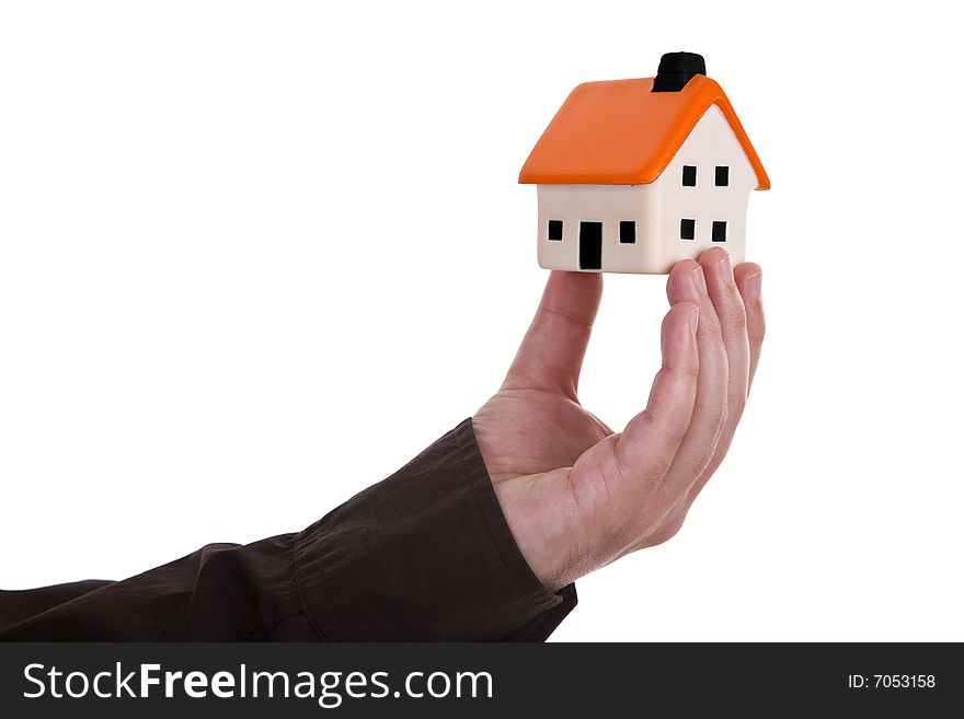 Human Hand Holding A House