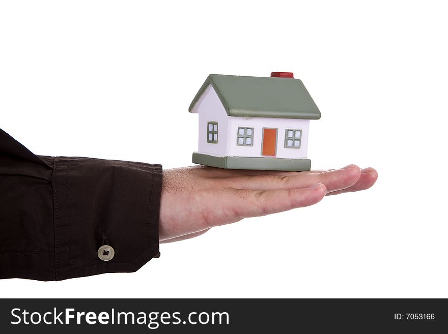 Man Holding A Small House