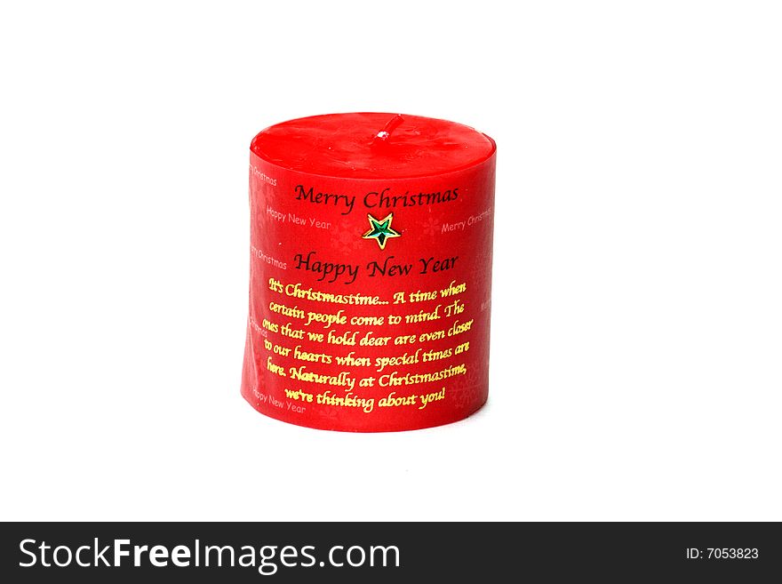 Red candle with inscription as  Christmas decoration