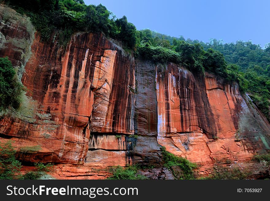 The physiognomy is very special in this area.all rocks are red here in guizhou provence in china. The physiognomy is very special in this area.all rocks are red here in guizhou provence in china.