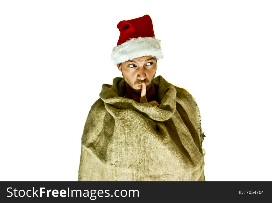 Man making christmas surprise standing in the santa bag. Man making christmas surprise standing in the santa bag