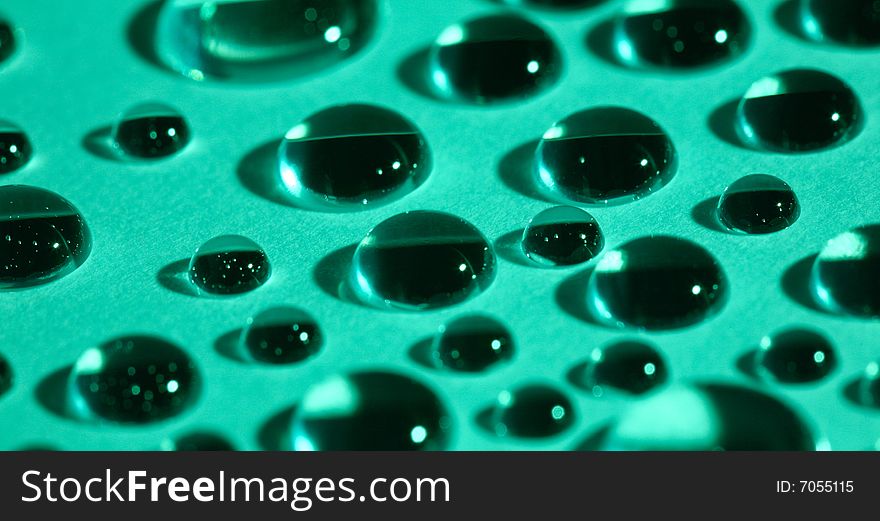 Water Drops On Green Glass