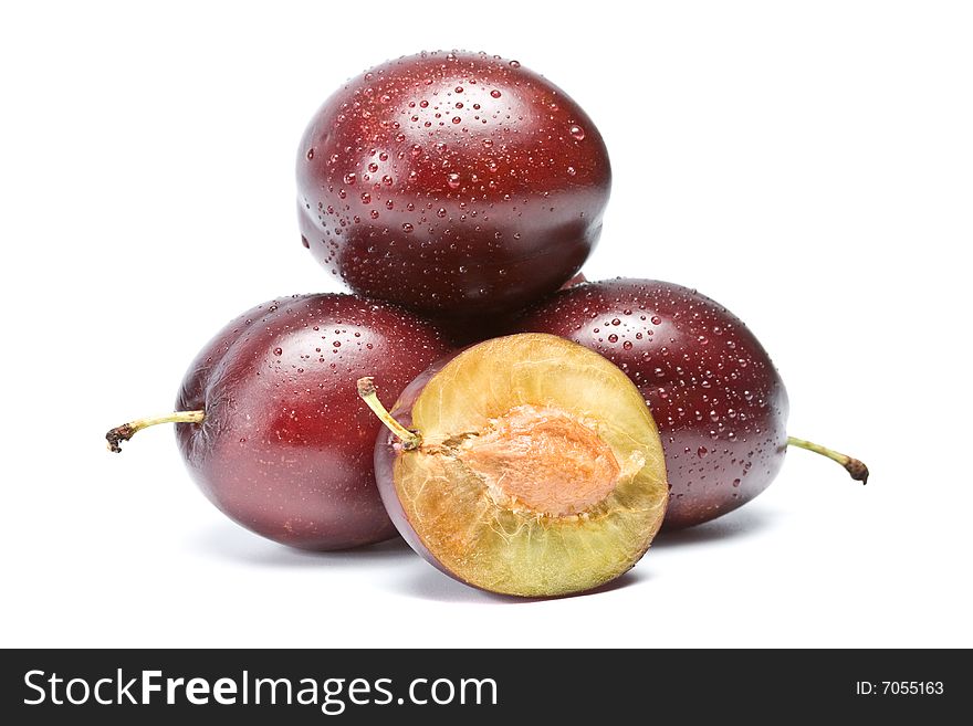 Three Plums On A White Background, Isolation