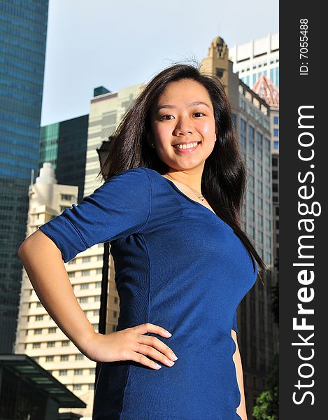 Asian Chinese Girl With Offices In The Background