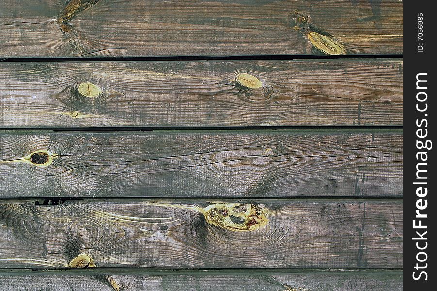 Old wooden wall with snags. Old wooden wall with snags