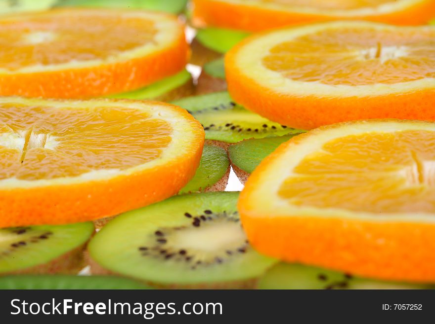 Orange and kiwi slices background