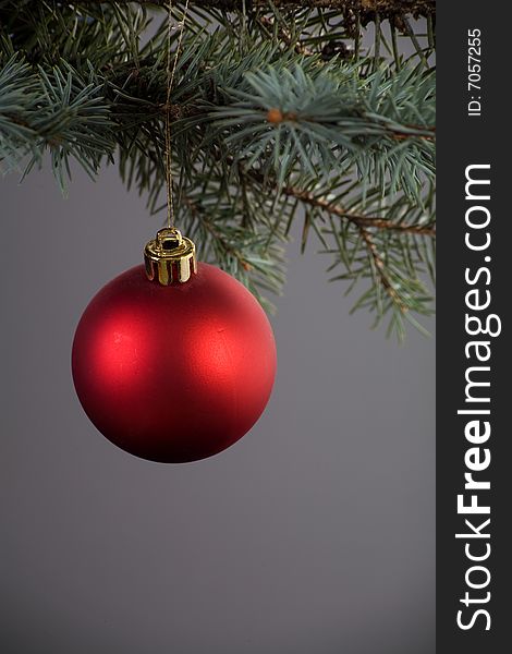 Red ball Christmas decoration on dark background. Red ball Christmas decoration on dark background