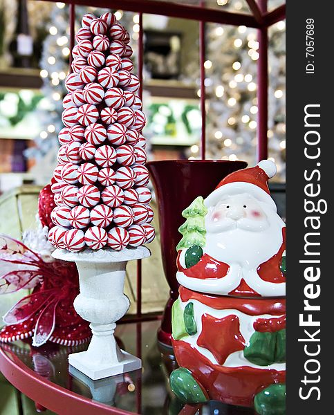 A peppermint candy tree and santa cookie jar. A peppermint candy tree and santa cookie jar.