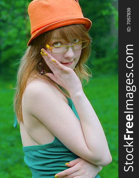 Beautiful girl in glasses outdoor