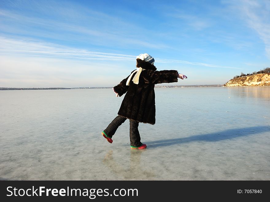 Frozen child on icy river