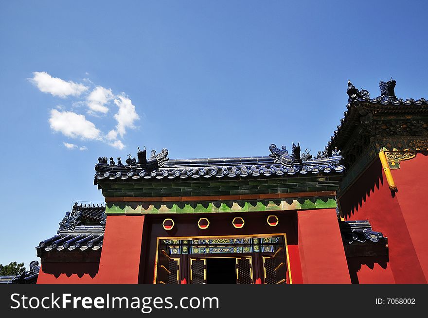 Chinese ancient building with red wall and glaze