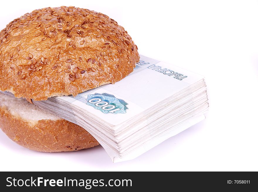 Sandwich with denominations instead of a stuffing on a white background. Sandwich with denominations instead of a stuffing on a white background