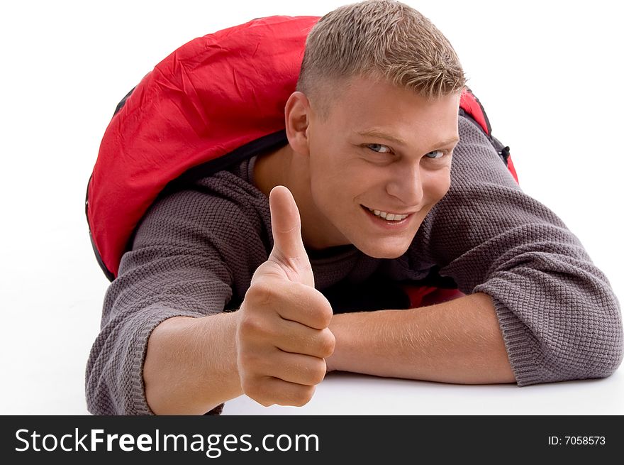 Young guy showing thumbs up with white background