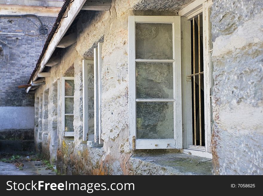 The windows of a frame house.