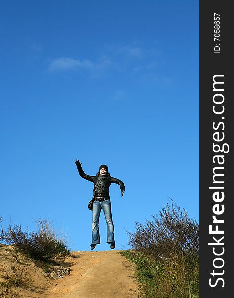 Girl in top with open arms - symbol of freedom