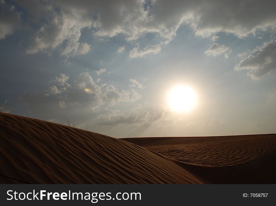 Desert Sunset in UAE With nice View of The Clouds in the Sky. Desert Sunset in UAE With nice View of The Clouds in the Sky