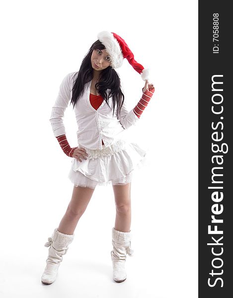 Full pose of young female standing and holding christmas hat with white background