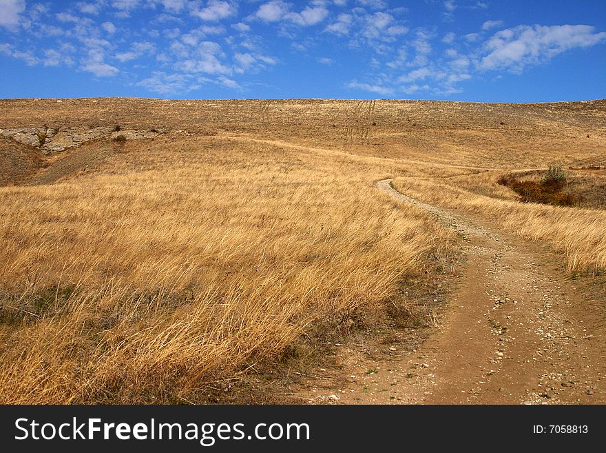 Road to Voloshin's hill. Autumn shot located Koktebel, Crimea, Ukraine. Road to Voloshin's hill. Autumn shot located Koktebel, Crimea, Ukraine