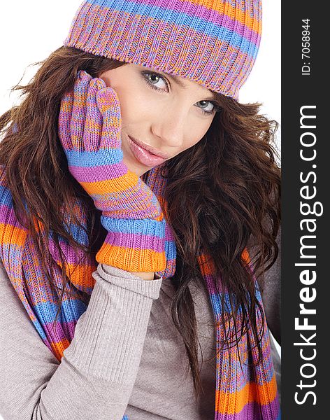 Portrait of winter girl wearing hat and gloves isolated on white background. winter fashion