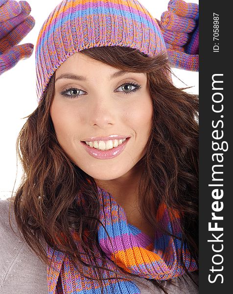 Portrait of winter girl wearing hat and gloves isolated on white background. winter fashion