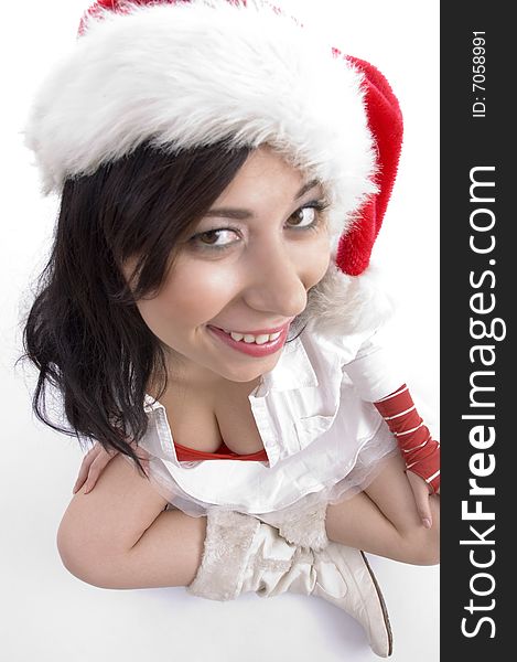 High angle view of model with christmas hat looking at camera with white background