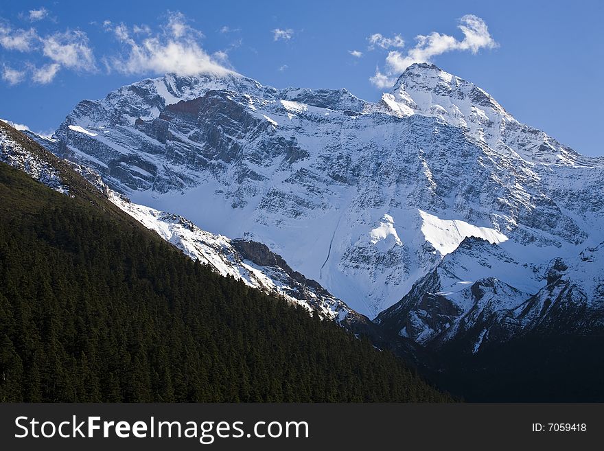 High mountains under snow in autumn in the southwest of china