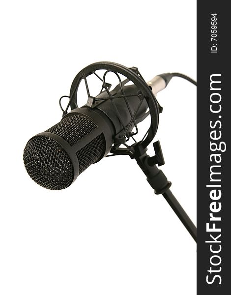 Black studio microphone isolated on the white background